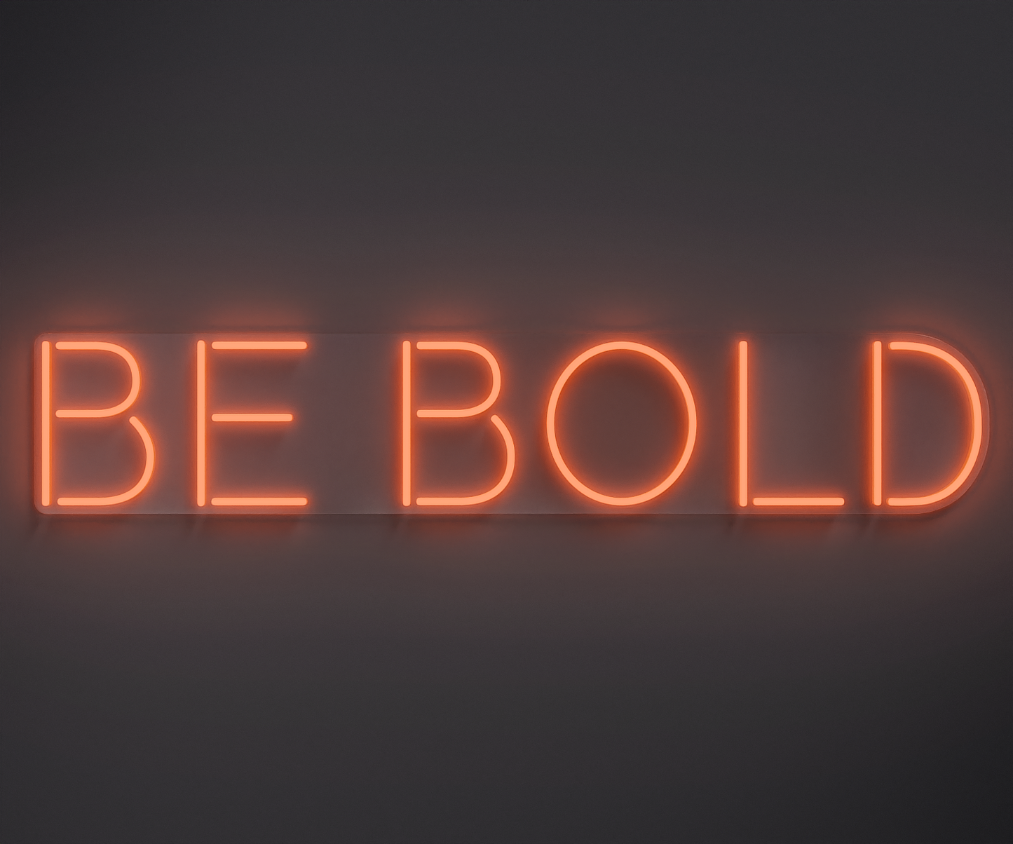 light orange neon sign that says be bold