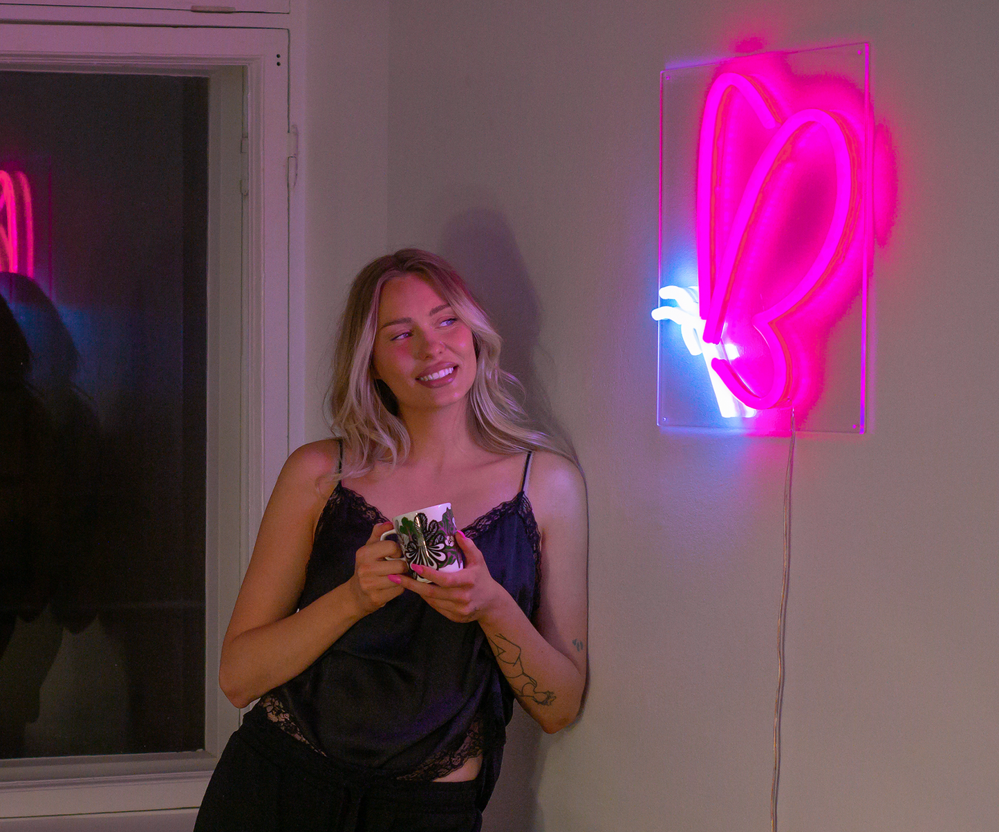 Girl and a butterfly neon sign