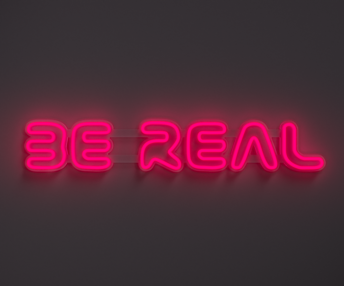 pink neon sign that says be real