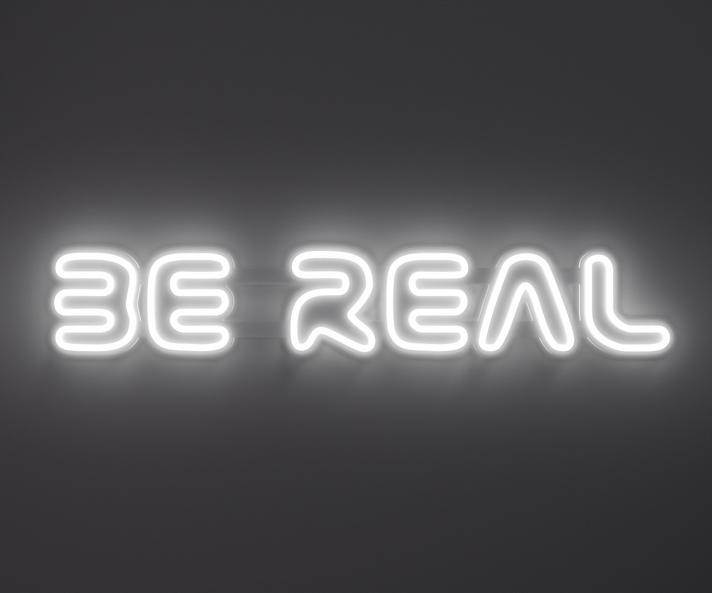 white neon sign that says be real