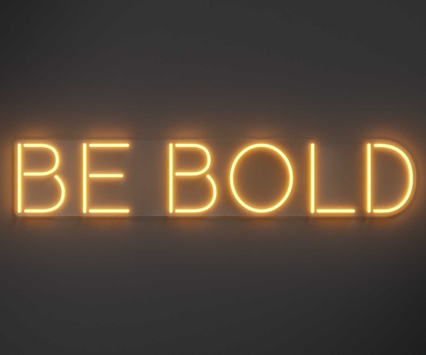 warm white neon sign that says be bold