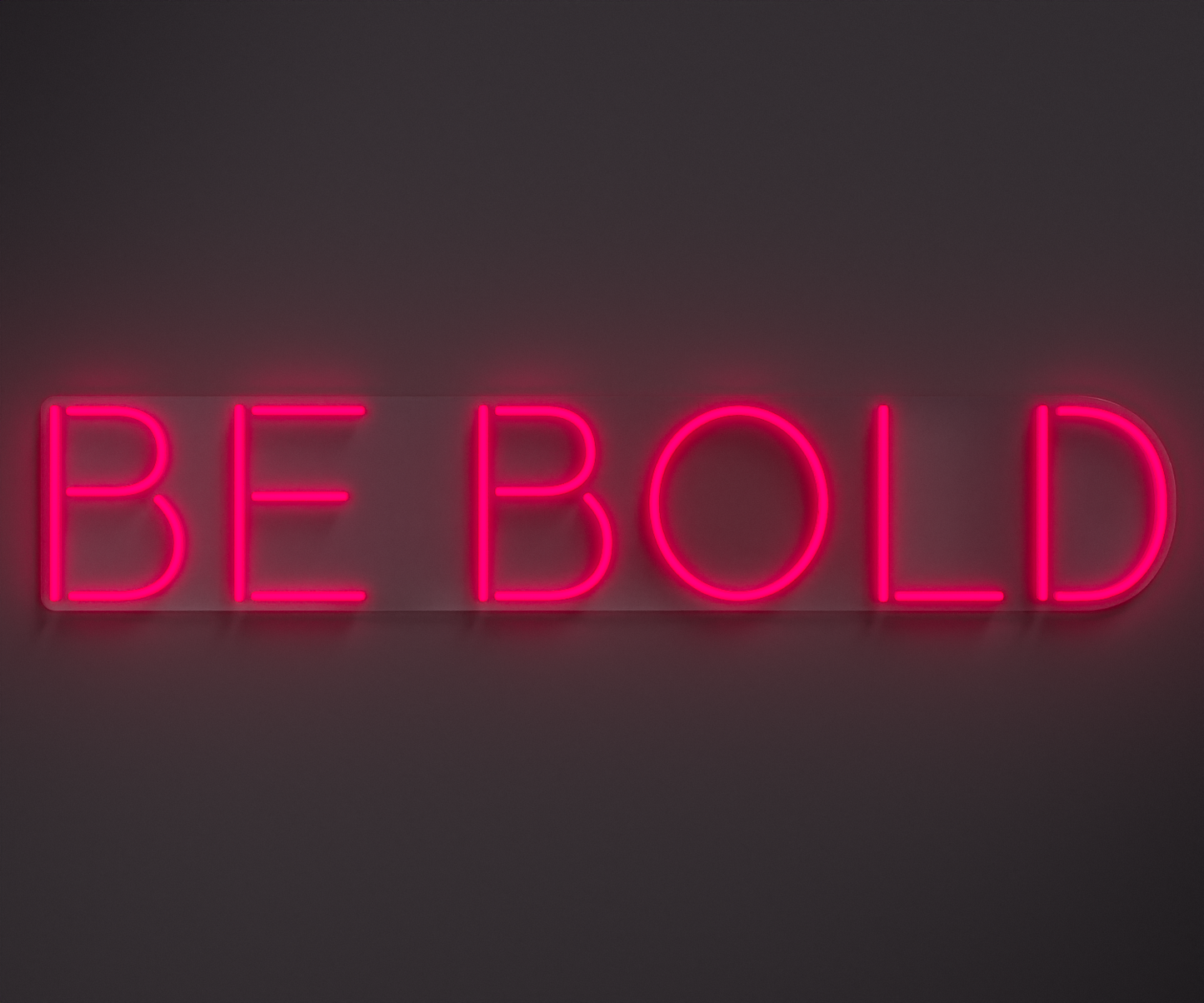 pink neon sign that says be bold