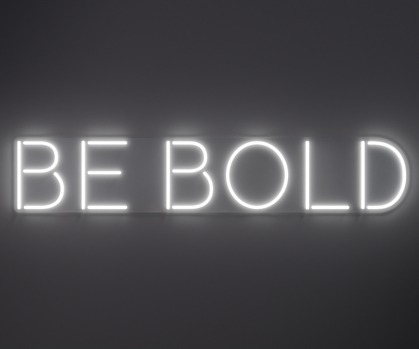 white neon sign that says be bold