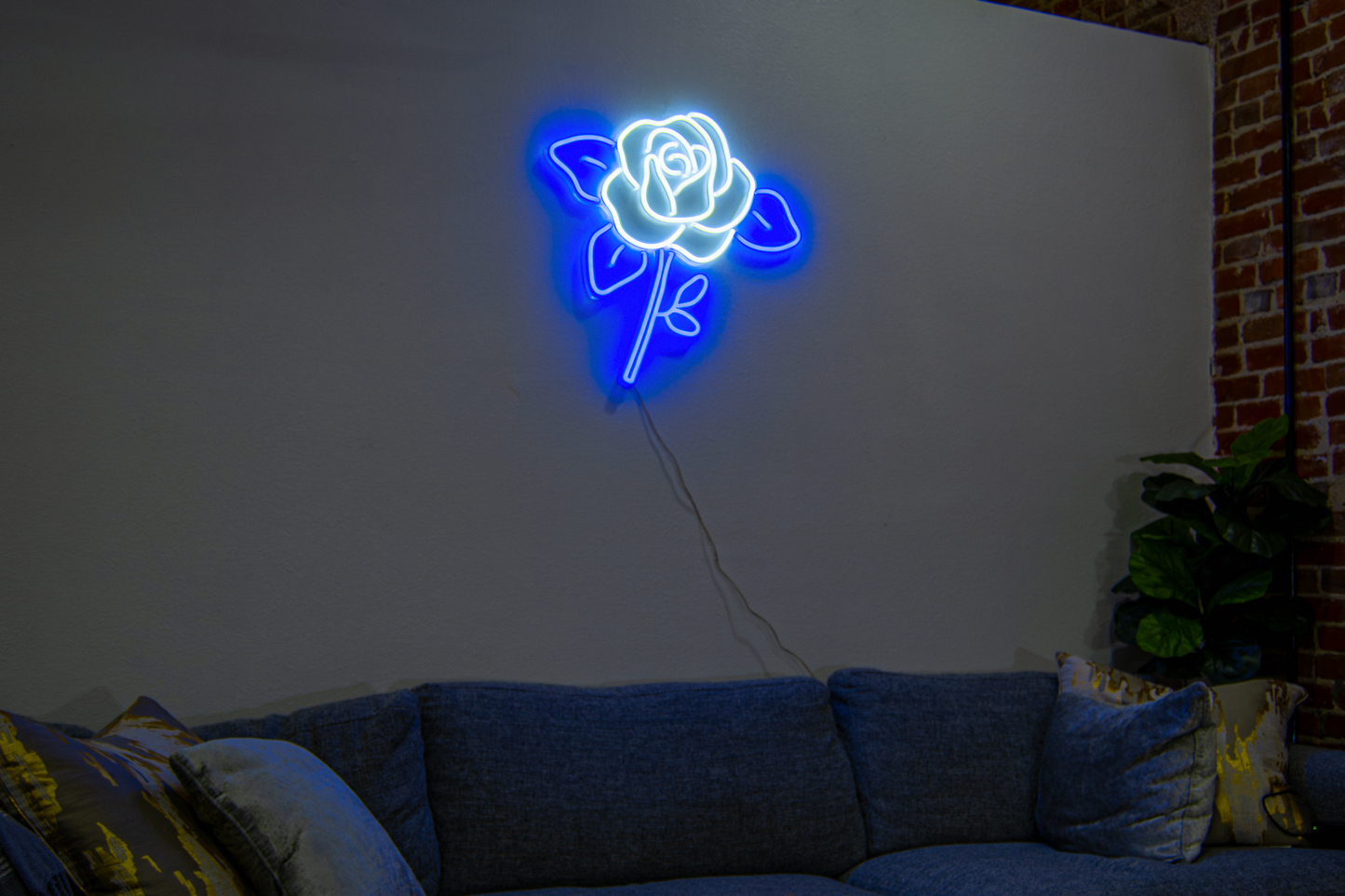 A white and blue flower neon sign