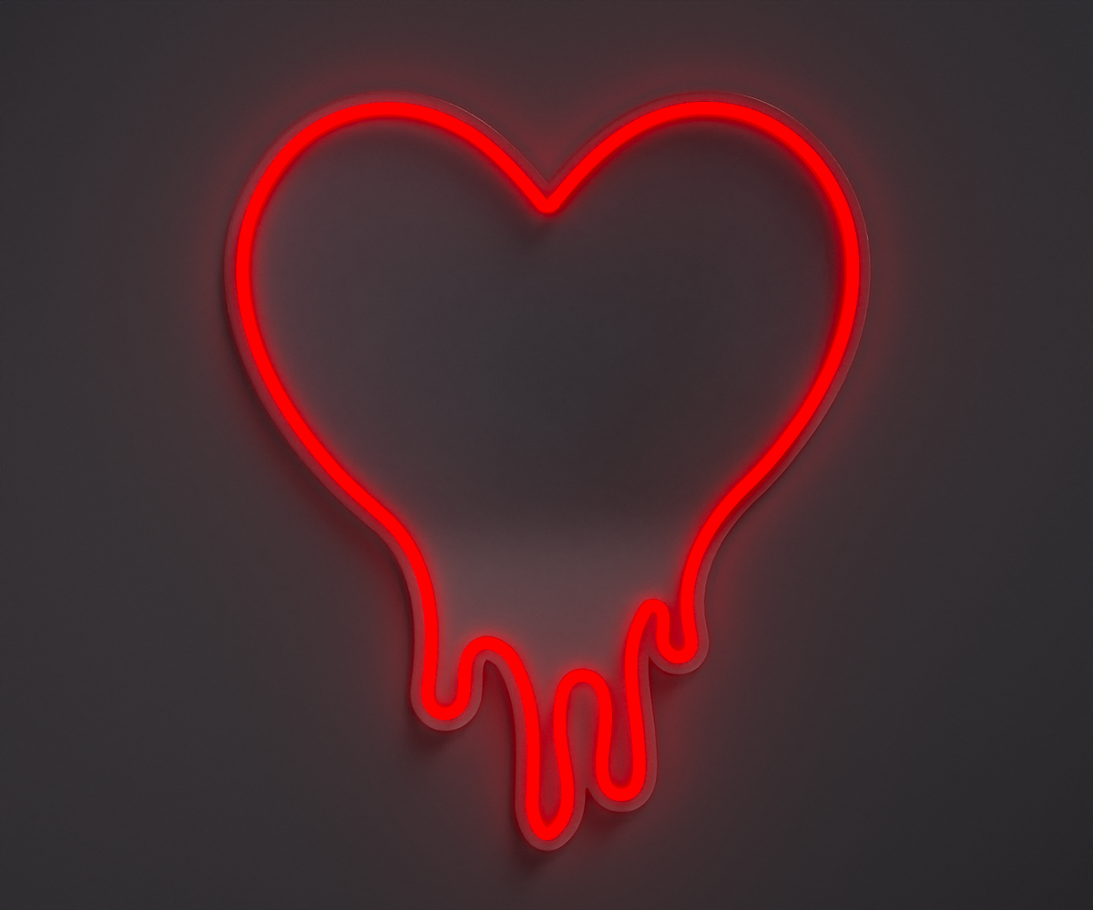 red melting heart neon sign