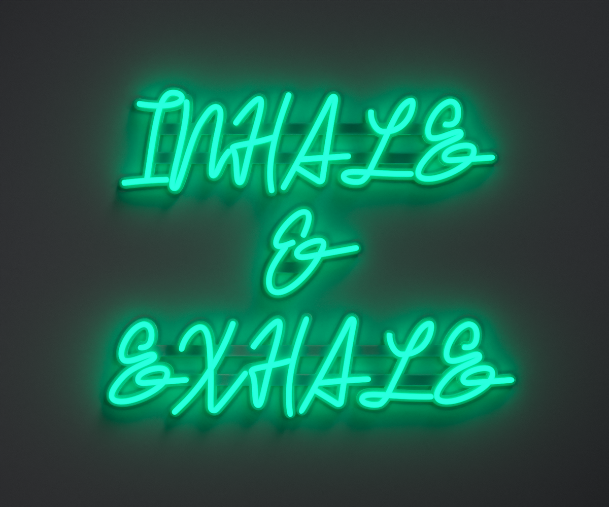 turquoise neon sign that says inhale and exhale