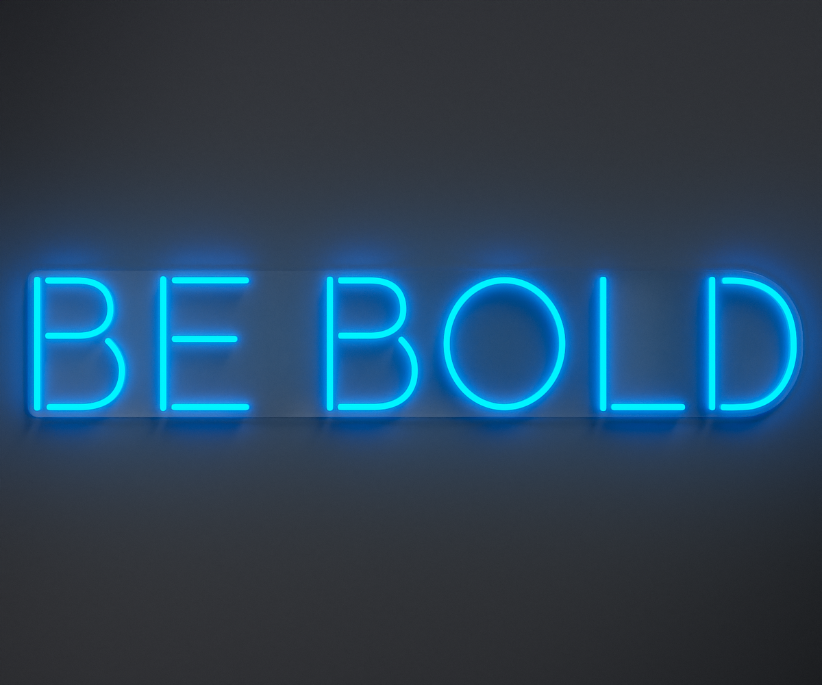 light blue neon sign that says be bold