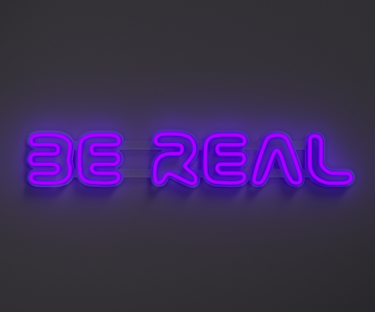 purple  neon sign that says be real