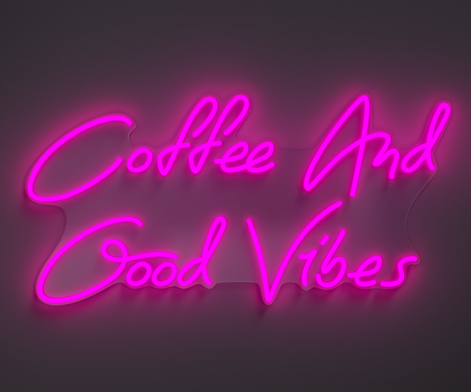 light pink neon sign that says coffee and good vibes