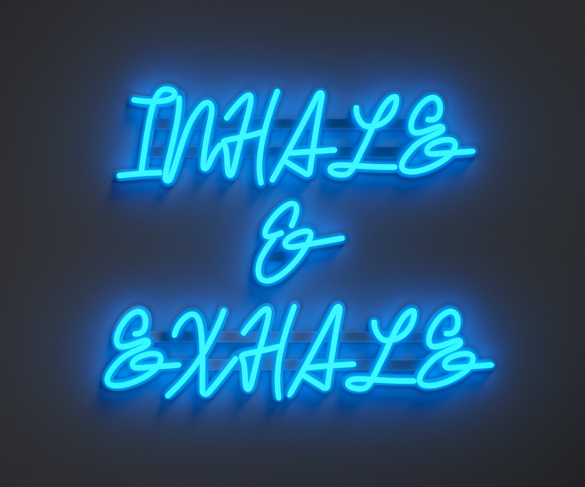 light blue neon sign that says inhale and exhale