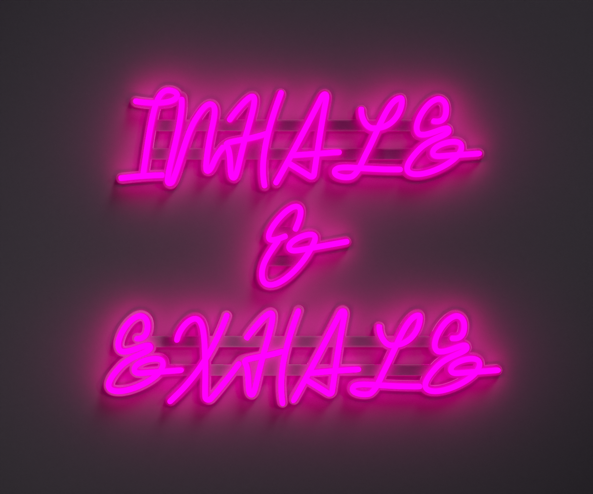 light pink neon sign that says inhale and exhale