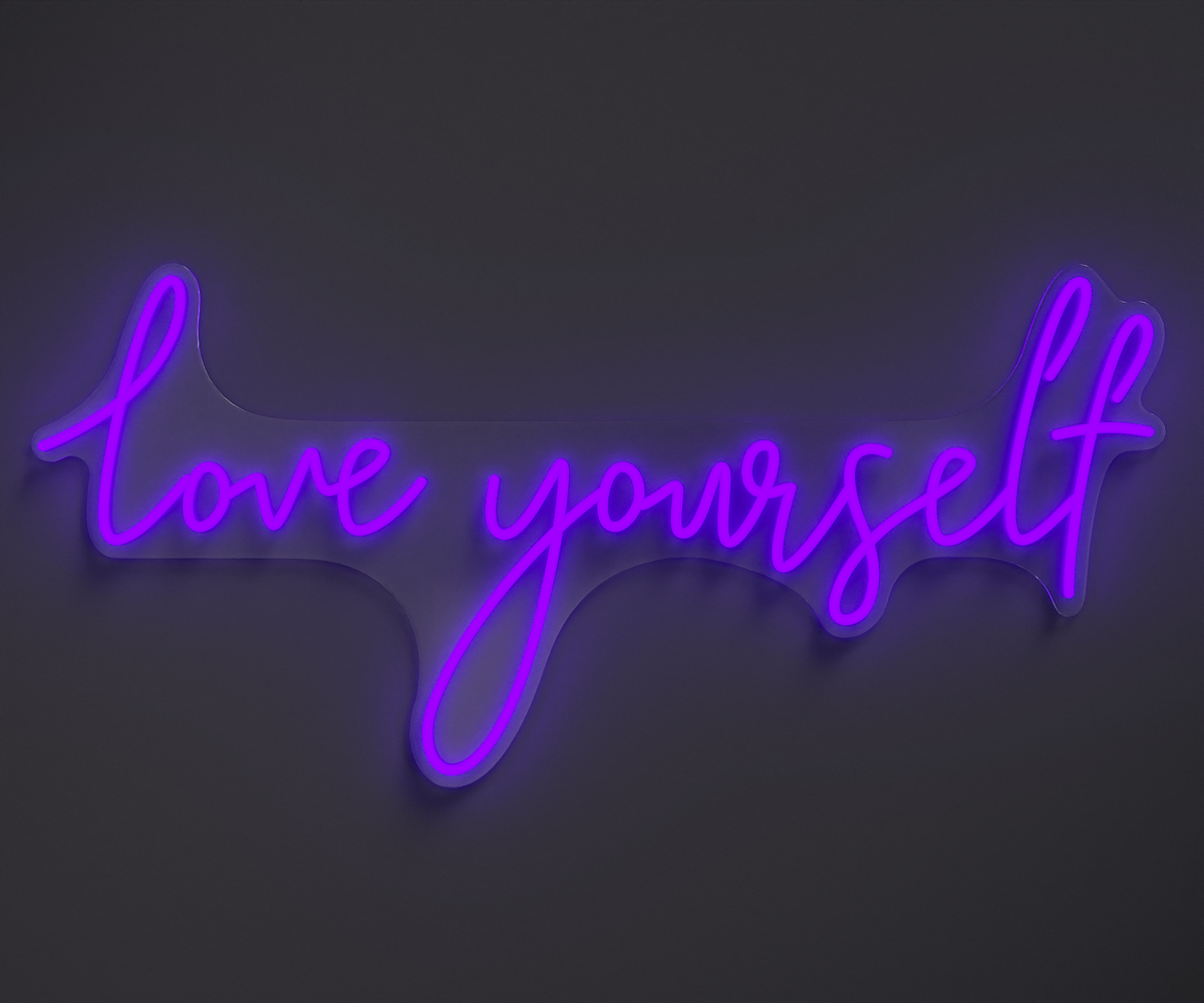 purple neon sign that says love yourself