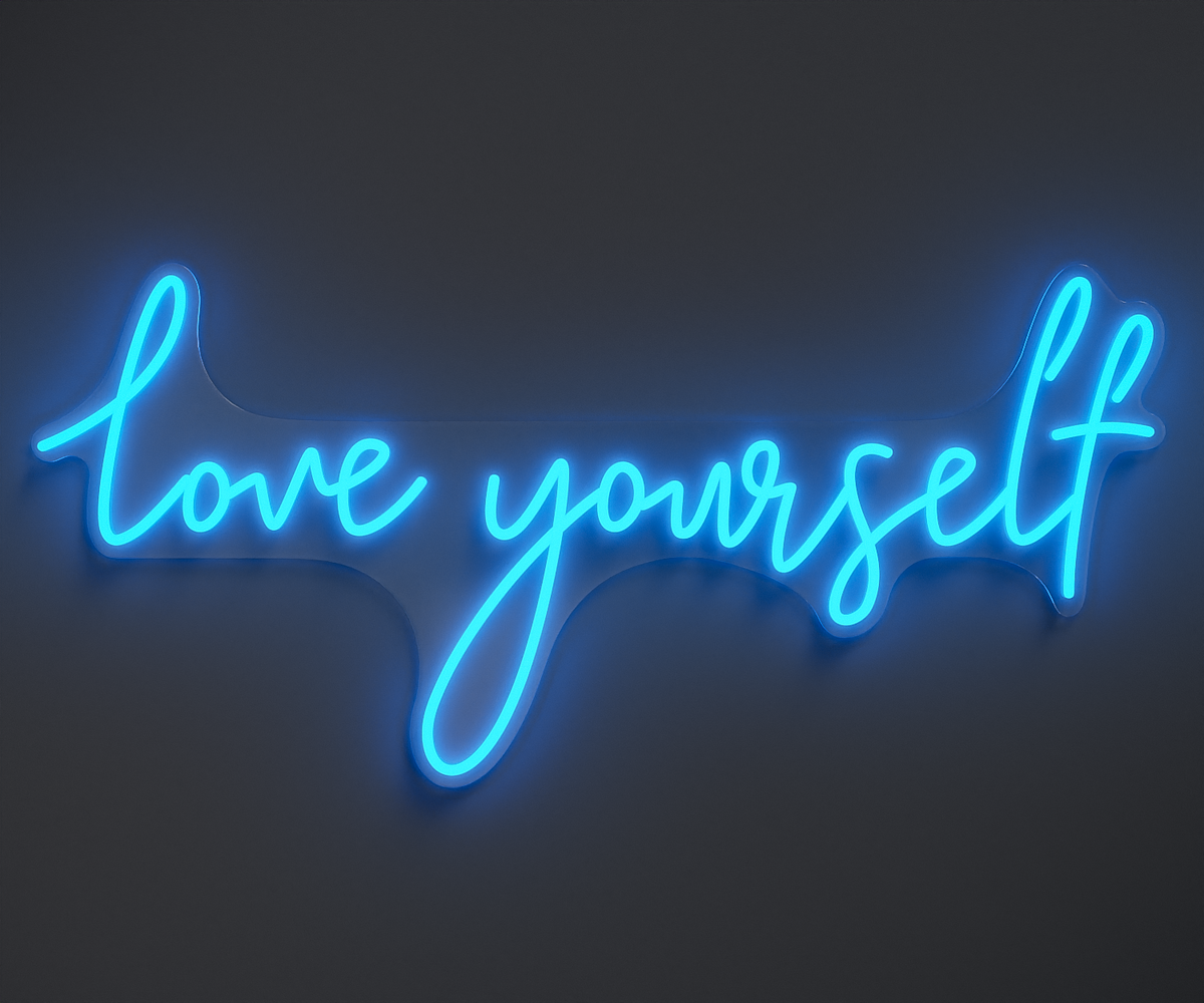 light blue neon sign that says love yourself