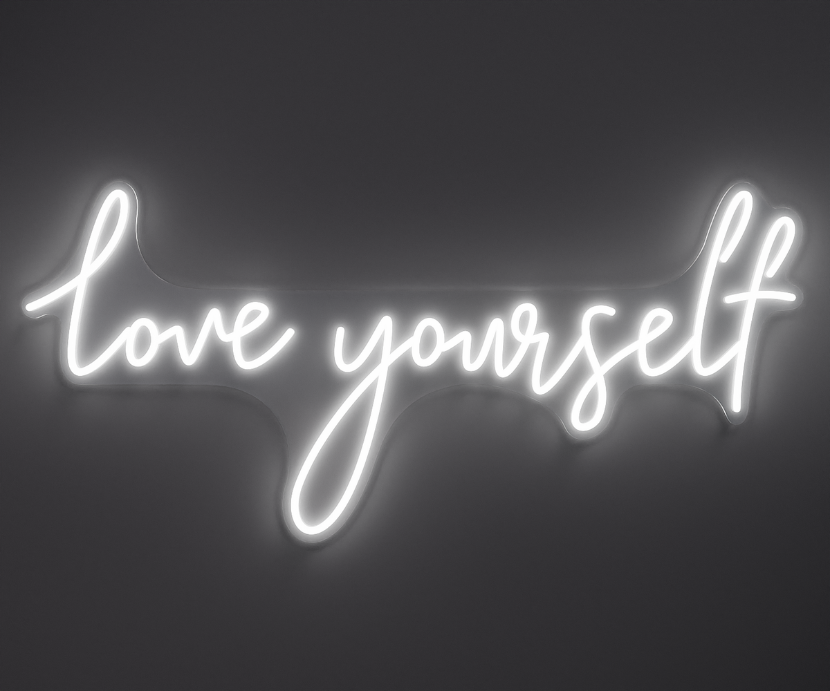 white neon sign that says love yourself