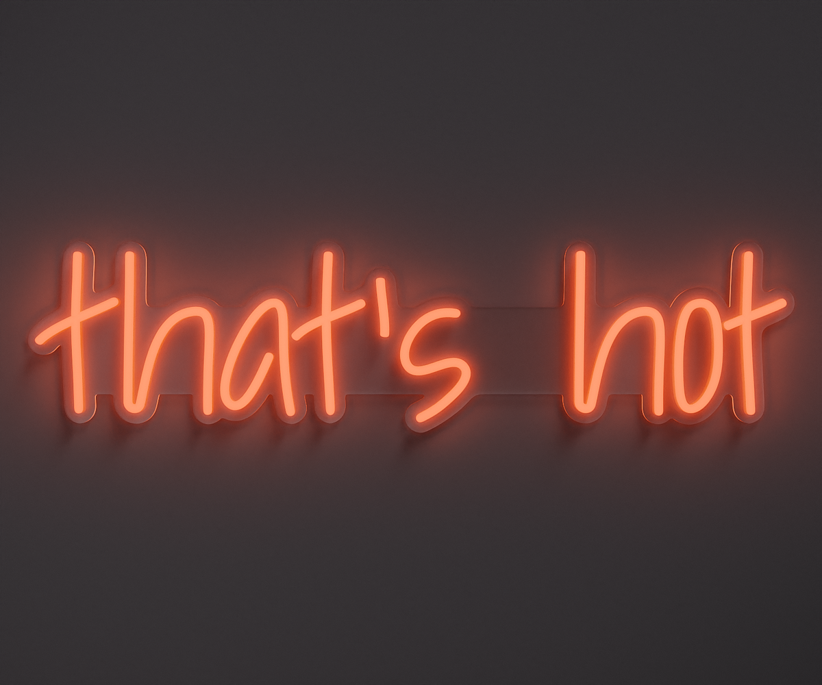 a light orange neon sign that says that's hot