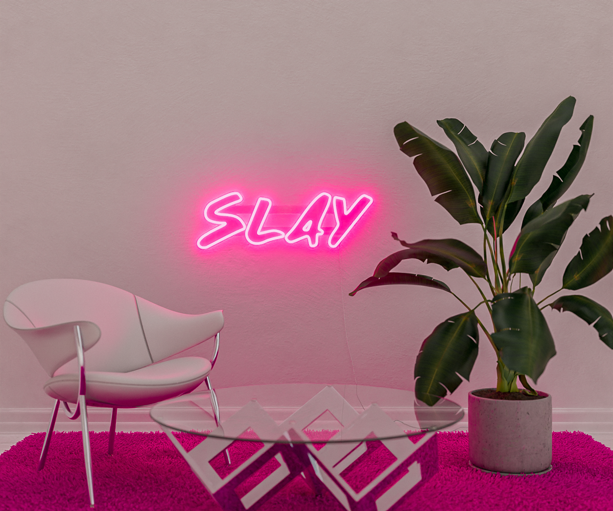 Pink Slay Neon Sign In Living Room