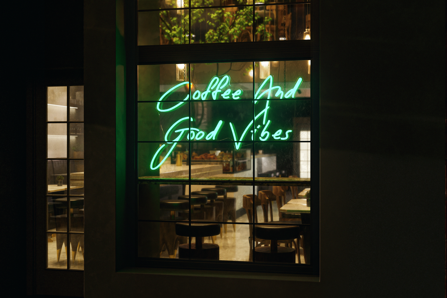 A green neon sign that says coffee and good vibes