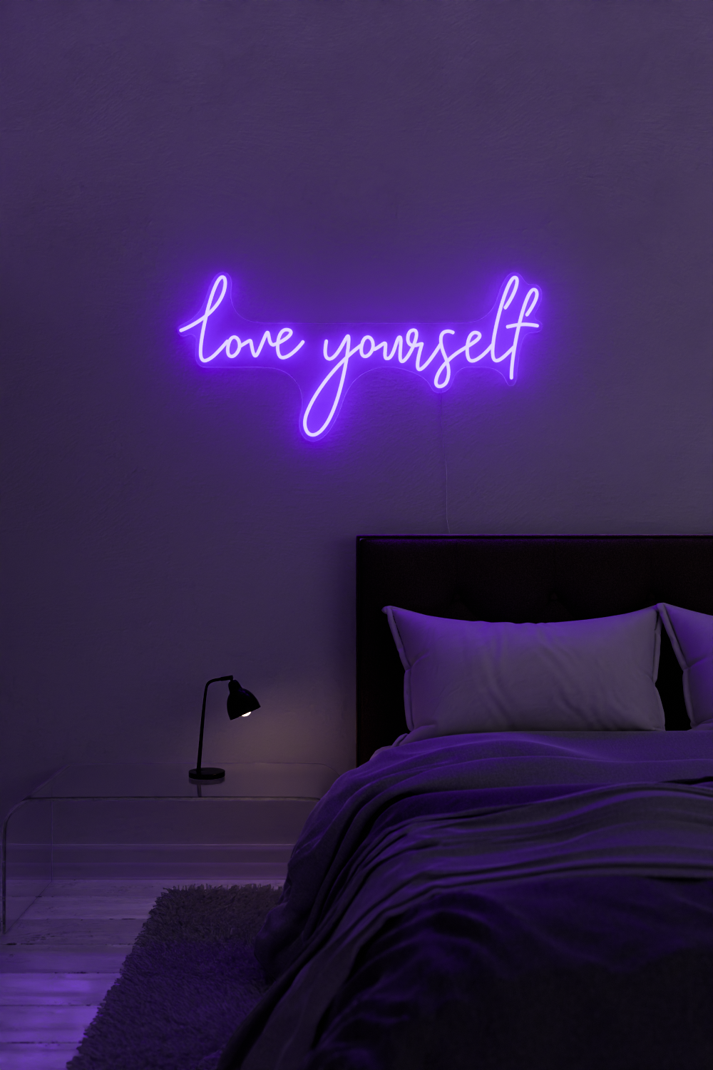 A purple neon sign that says "love yourself" in a bedroom