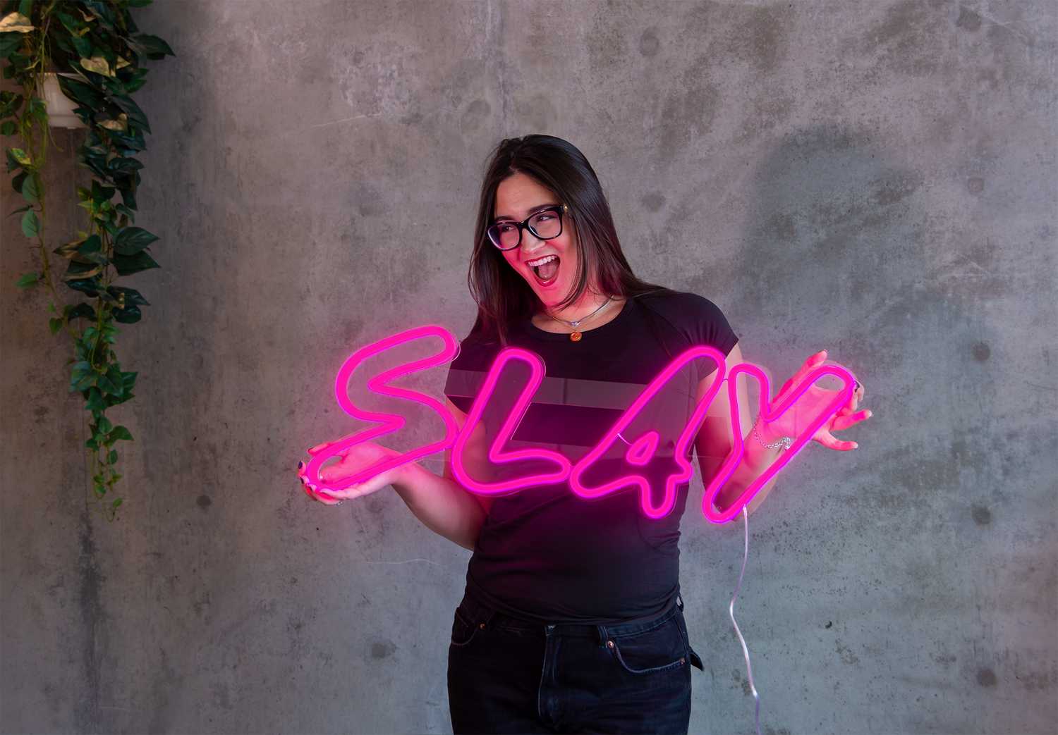 A pink custom neon sign